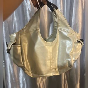 Cream purse: Charles & Keith with side pockets